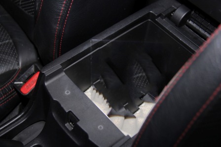 Centre console of vehicle where improvised glass pipes, ziplock bags and a weighing scale were found Centre console of vehicle where improvised glass pipes, ziplock bags and a weighing scale were found