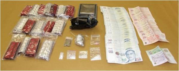 Part of CNB’s seizure on 19 March 2012, including Erimin-5 and cash