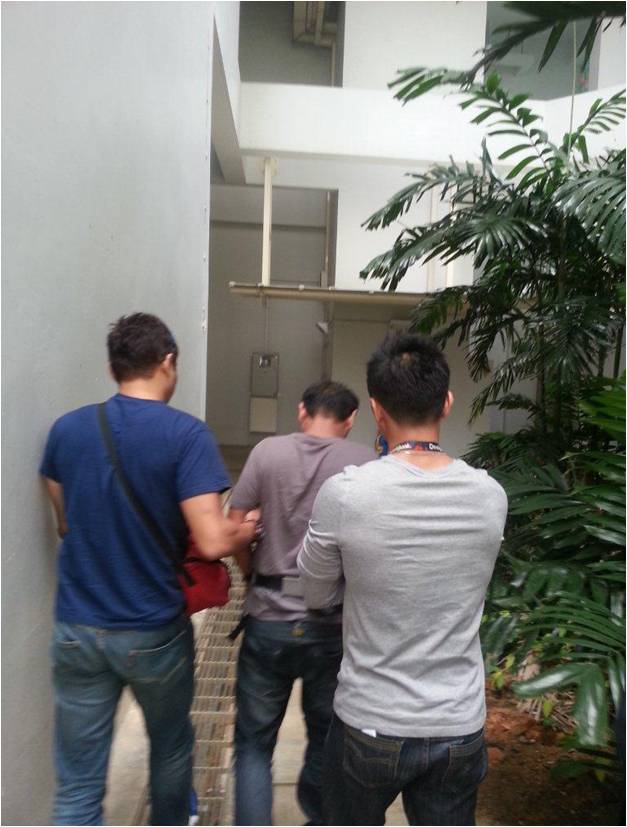 Photo 1: Arrest of a drug offender by CNB officers
