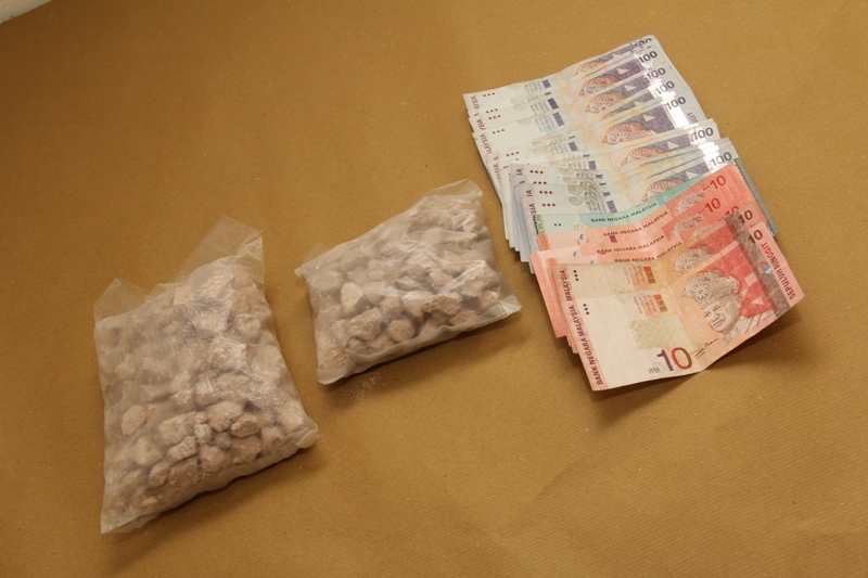 Drugs and money seized in the Yishun operation Drugs and money seized in the Yishun operation