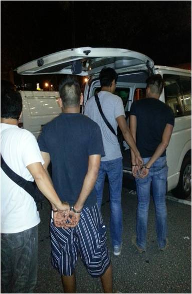 Suspects being arrested by CNB officers in 7 to 11 Jan 2013 operations