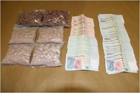 Drugs and cash seized during the operation on 30 April 2013