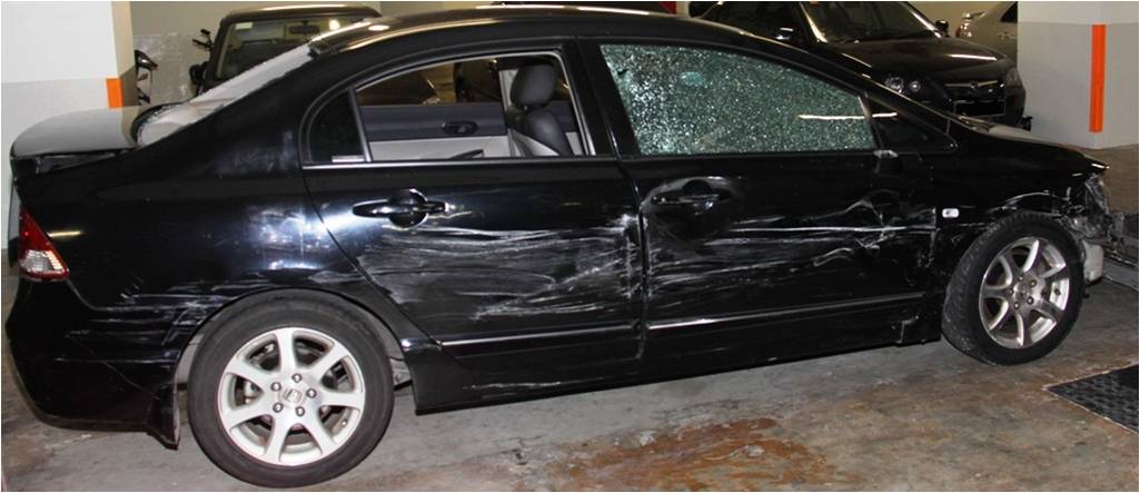 The damaged vehicle that the suspect used to evade arrest