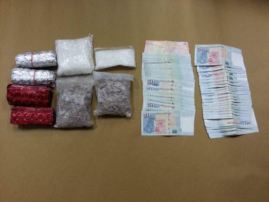 Photo 4 Drugs and cash seized in a CNB operation on 30 October 2014