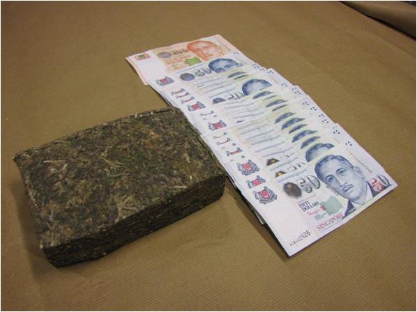 Cannabis and cash seized in a CNB operation at Ang Mo Kio on 12 Feb 2014.