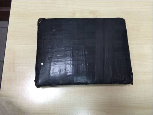 Black bundle found inside bag carried by 36-year-old male Singaporean suspect
