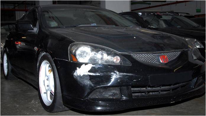 A drug suspect’s vehicle that rammed a CNB vehicle during a CNB operation on 17 January 2014 A drug suspect’s vehicle that rammed a CNB vehicle during a CNB operation on 17 January 2014
