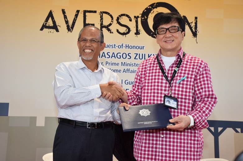 Photo 1 - 2Min Mr Masagos Zulkifli (Home Affairs) appointing Mr Jackie Chan as Singapore's first celebrity anti-drug ambassador