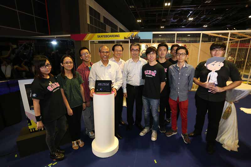 Guest-of-Honour Minister Masagos, Prime Minister’s Office and Second Minister for Home Affairs and Foreign Affairs, Mr Chan Lee Mun, Principal & CEO, Nanyang Polytechnic, Mr Ng Ser Song, Director, Central Narcotics Bureau with students from Nanyang Polytechnic’s School of Interactive and Digital Media at the launch of ‘Nelzon'