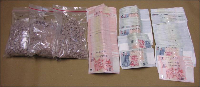 Heroin and cash seized in operation on 27 July 2015