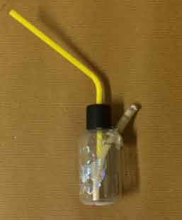 Photo 2: An improvised drug-smoking apparatus Photo 2: An improvised drug-smoking apparatus