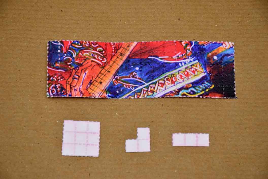 Photo 1: LSD stamps seized from the suspected drug trafficker 