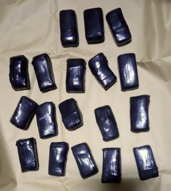 Photo-1: Cannabis wrapped in bundle, recovered from within Kim Tian Road unit on 5 Jan 2016 Photo-1: Cannabis wrapped in bundle, recovered from within Kim Tian Road unit on 5 Jan 2016