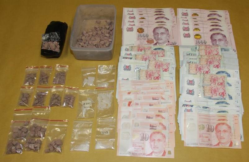 Photo 1: Heroin, ‘Ice’ and cash seized during CNB operation on 4 August 2016.