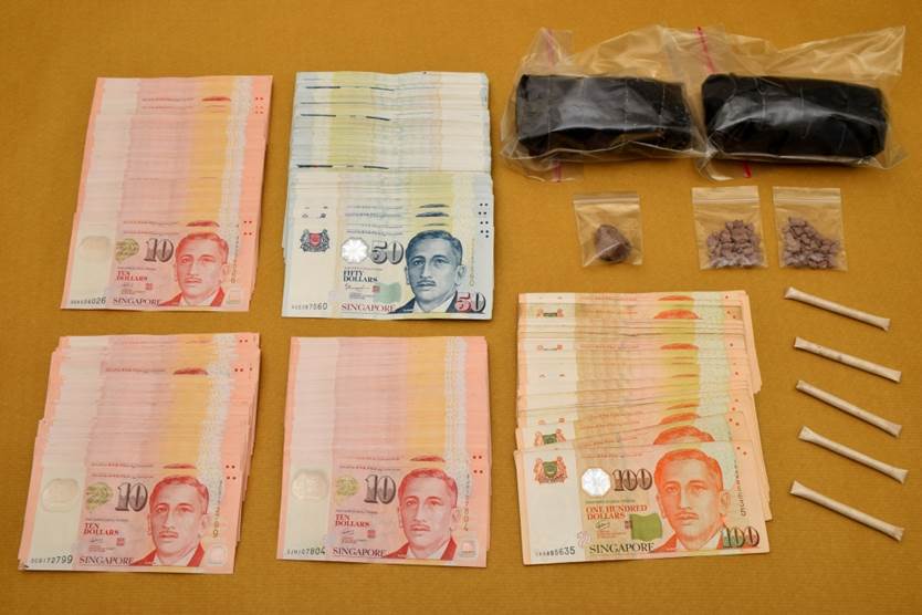 Photo 1: Drugs and cash seized in CNB drug bust at Jalan Bukit Merah on 23 June 2016.