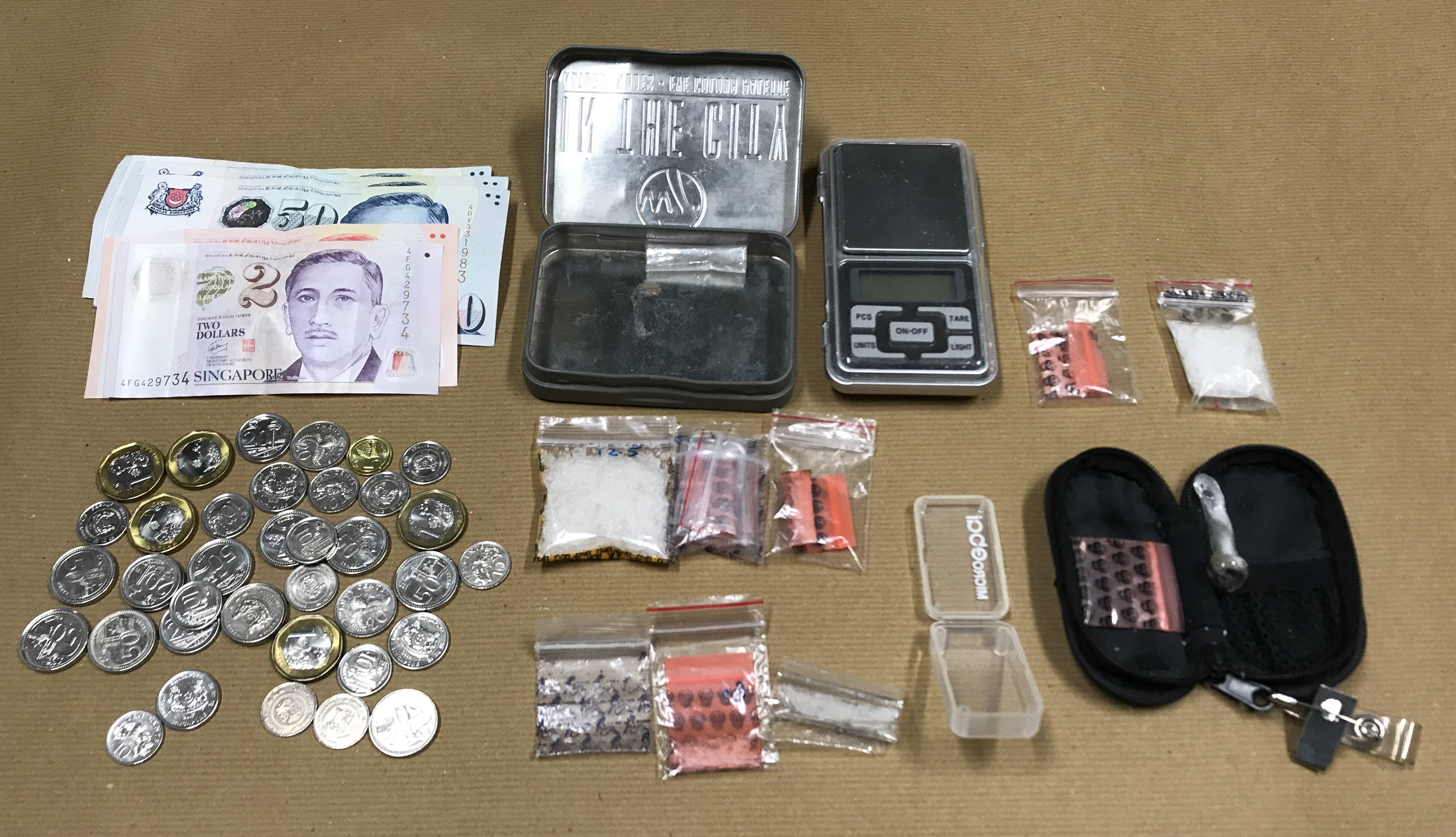 Cash and drugs seized