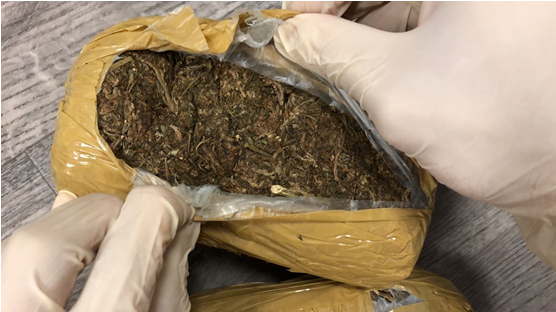 Photo-2 (CNB): Close-up view of cannabis found concealed in box labelled as containing food items, recovered from a male foreign national on 9 July 2018. 