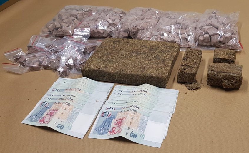 Photo-3 (CNB): Heroin, cannabis and cash seized in CNB operation on 13 June 2018. Photo-3 (CNB): Heroin, cannabis and cash seized in CNB operation on 13 June 2018.