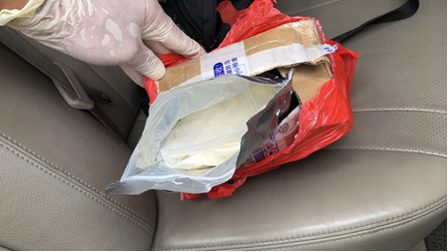 Photo-1 (CNB): About 506g of powder found on rear car seat at Norris Road, during CNB operation on 18 July 2018.