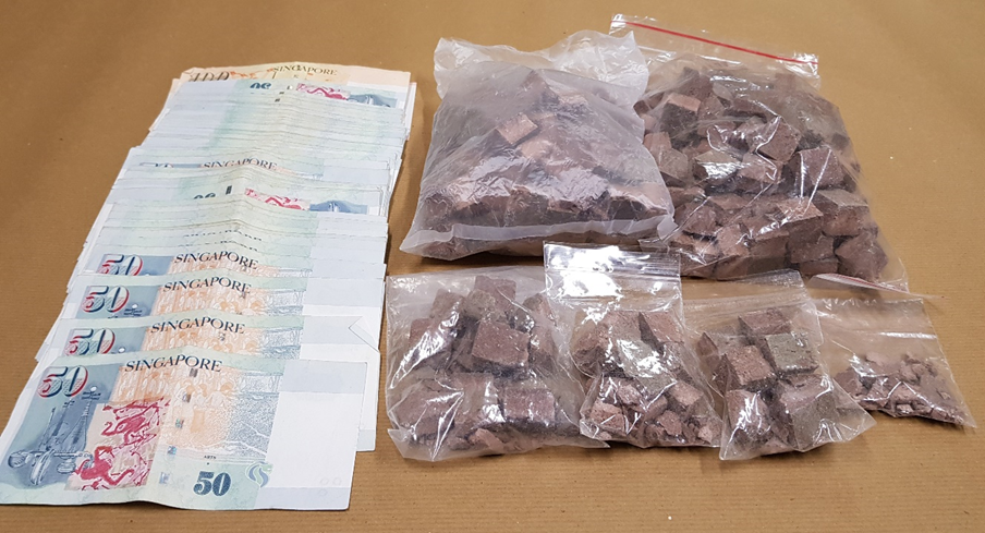 Photo-2 (CNB): Heroin and cash seized in CNB operation on 21 June 2018