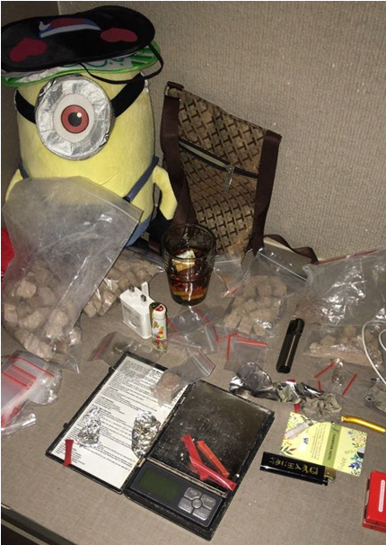 Photo-1: Heroin packed in large and small plastic bags, digital weighing scale and cut straws containing heroin, found in the hotel room where a 51-year-old suspected drug trafficker was hiding out at Joo Chiat, in CNB operation on 27 February 2018.