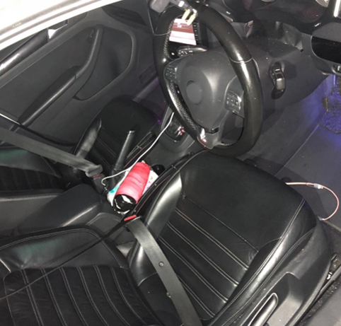 Photo-2 (CNB): Photo of interior of white Volkswagen.  About 524g of ‘Ice’, packed in a bundle, were recovered from within, in CNB operation on 27 September 2018.