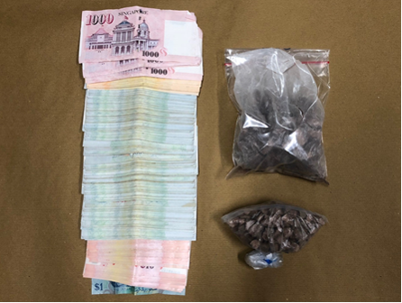 Photo-2: Heroin and cash recovered from a unit at Jalan Bahagia on 8 January 2018.