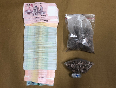 Photo-2: Heroin and cash recovered from a unit at Jalan Bahagia on 8 January 2018. Photo-2: Heroin and cash recovered from a unit at Jalan Bahagia on 8 January 2018.