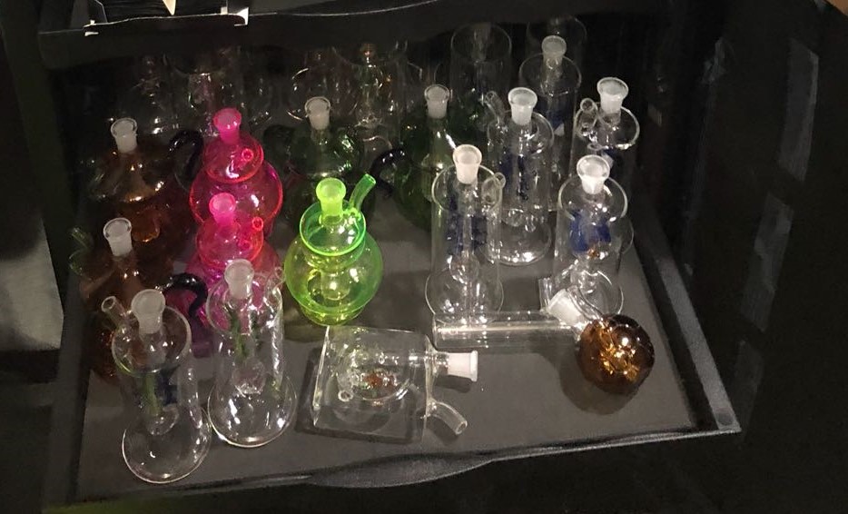 Photo-2: Various glass drug-smoking apparatus recovered in CNB operation at Henderson Crescent on 12 March 2018.