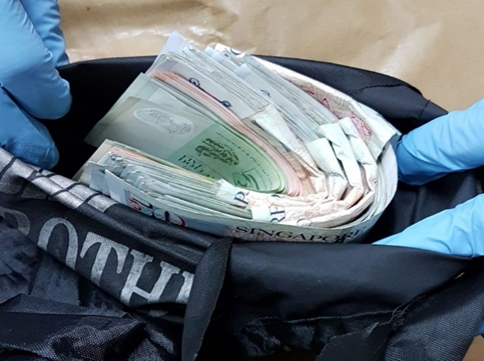 Photo-1 (CNB): Cash of S$5,200 recovered from the Malaysian suspect arrested in CNB operation on 20 February 2019.