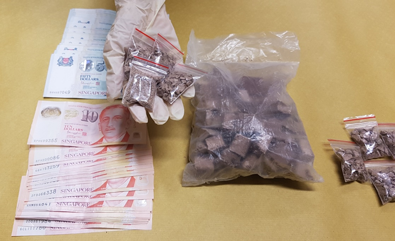 Photo-4 (CNB): Heroin and cash seized in CNB operation on 20 February 2019