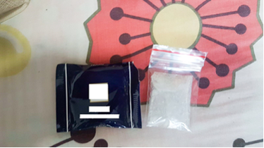 Photo-1: ‘Ice’ packed and concealed to appear as chocolate snack, recovered from a suspected drug trafficker’s hideout in the vicinity of Rangoon Road, on 22 January 2018. Photo-1: ‘Ice’ packed and concealed to appear as chocolate snack, recovered from a suspected drug trafficker’s hideout in the vicinity of Rangoon Road, on 22 January 2018.