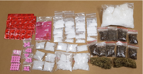 Photo-2: Variety of drugs (including ‘Ice’, cannabis, ketamine and Erimin-5) seized from a suspected drug trafficker’s hideout in the vicinity of Rangoon Road, on 22 January 2018.