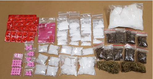 Photo-2: Variety of drugs (including ‘Ice’, cannabis, ketamine and Erimin-5) seized from a suspected drug trafficker’s hideout in the vicinity of Rangoon Road, on 22 January 2018. Photo-2: Variety of drugs (including ‘Ice’, cannabis, ketamine and Erimin-5) seized from a suspected drug trafficker’s hideout in the vicinity of Rangoon Road, on 22 January 2018.