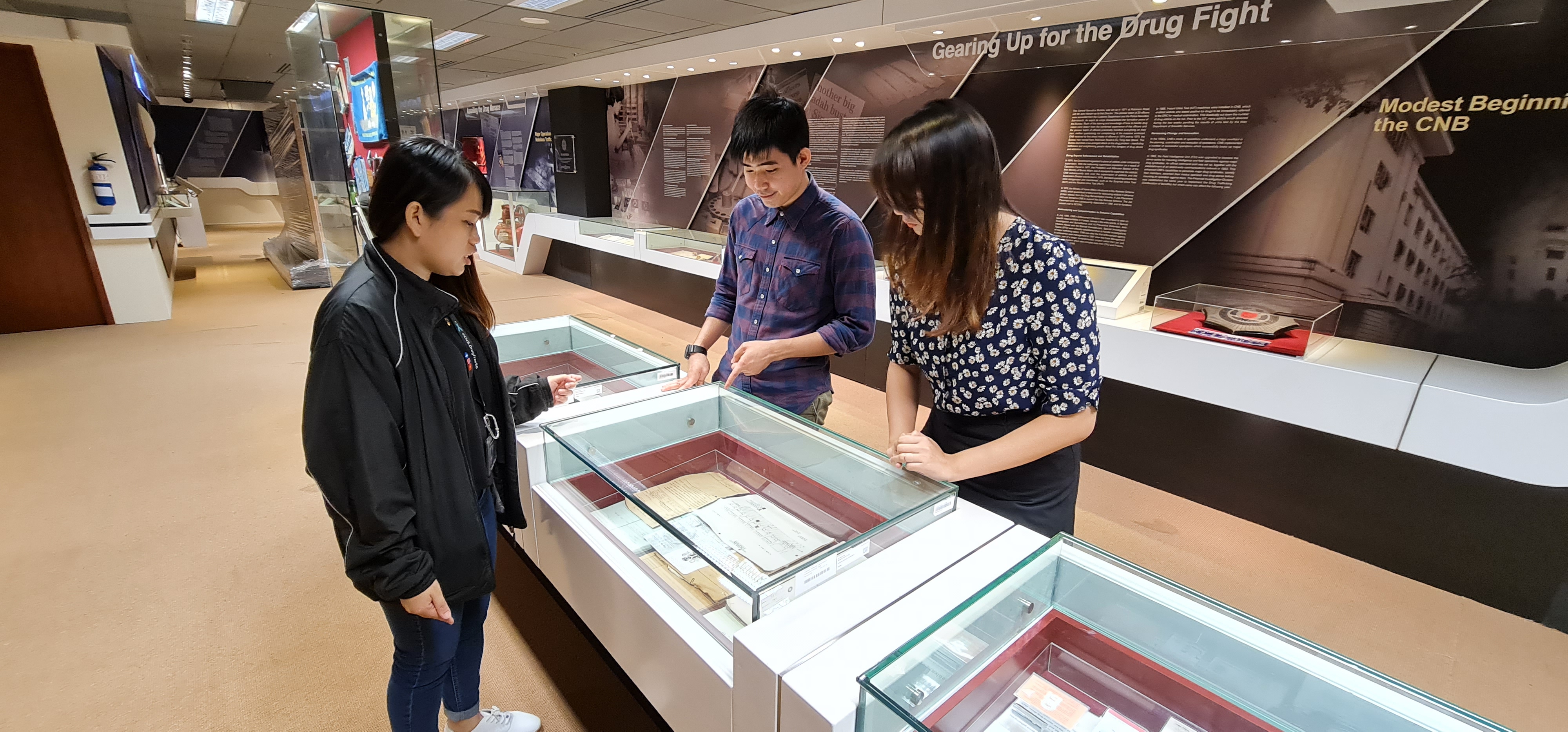 Visitors looking at gallery exhibition