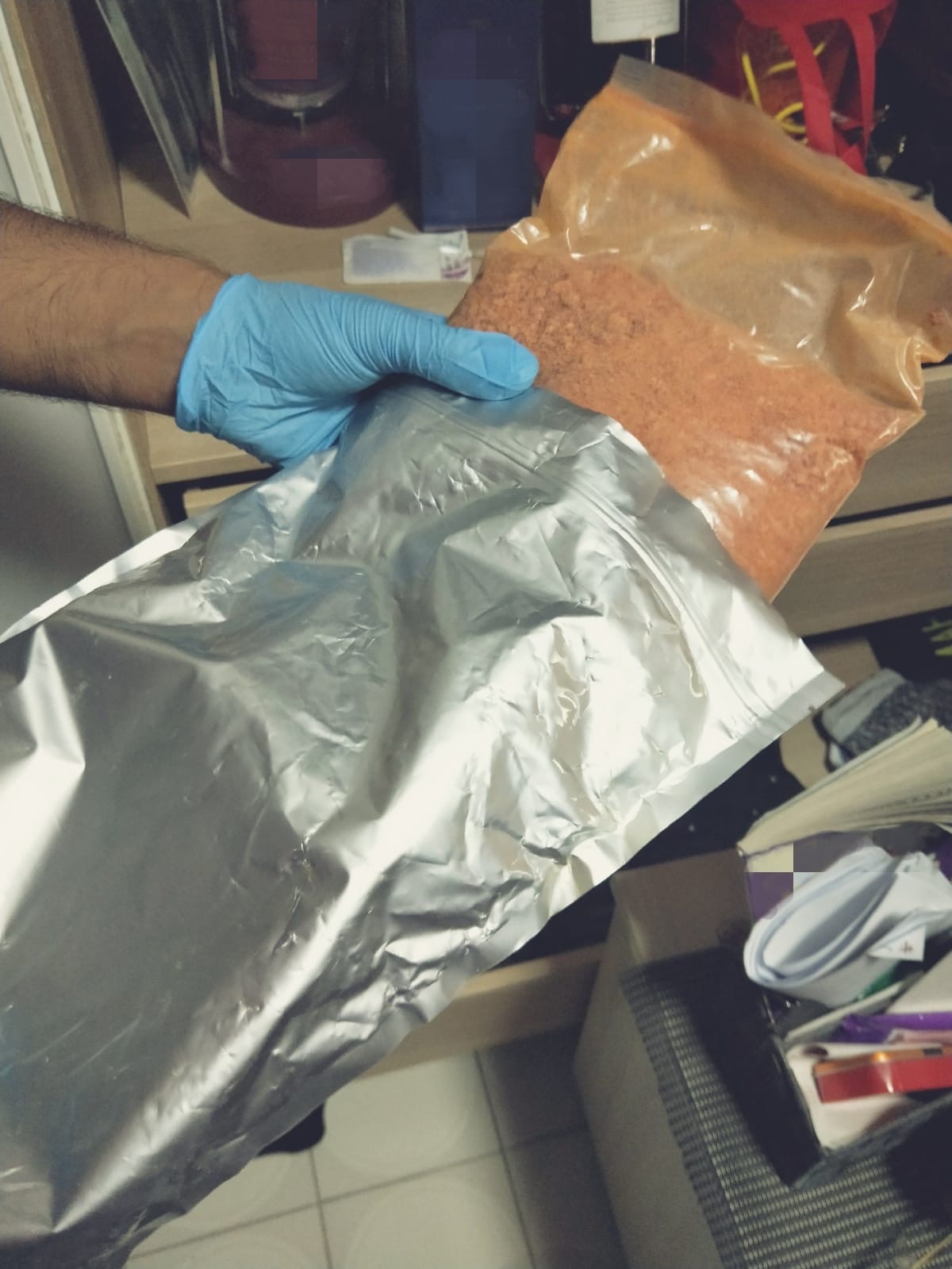 18 Sep 19_2 Photos- 1 and 2 (CNB): Brownish powdery substance recovered from CNB’s operation at Ang Mo Kio Ave 3 on 16 September 2019.