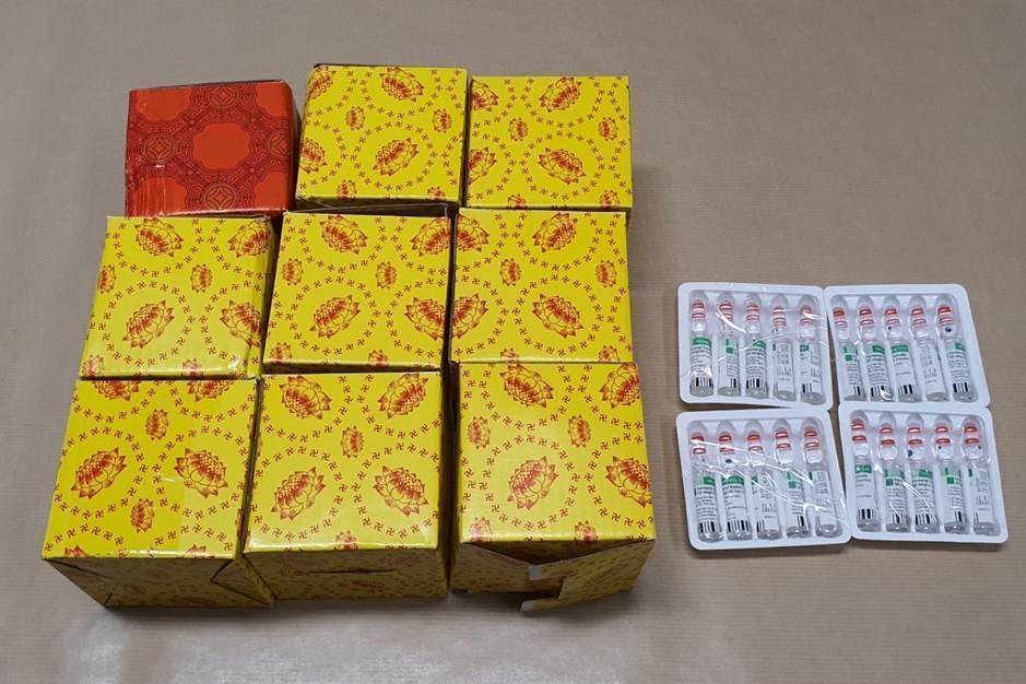Photo 1 (CNB): 200 vials believed to contain 2ml of fentanyl each, detected in a parcel by ICA officers on 1 March 2021. The parcel was later referred to CNB, who mounted an operation and arrested three suspected drug offenders in relation to the parcel. 