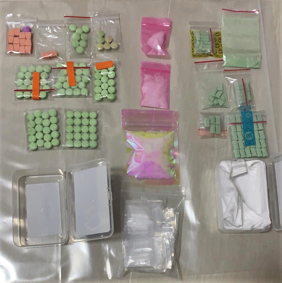 Photo 3- Packets of ‘Ice’ and ‘Ecstasy’ tablets seized in the vicinity Buangkok Crescent during CNB’s operation on 15 July 2020