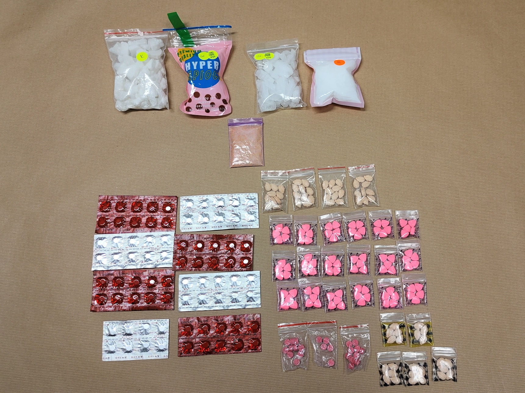 Photo 1 (CNB) : Some of the drugs recovered from a unit in the vicinity of Eng Hoon Street on 14 September 2020 Photo 1 (CNB) : Some of the drugs recovered from a unit in the vicinity of Eng Hoon Street on 14 September 2020