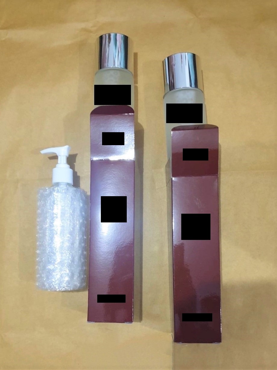 Photo 2: Bottles containing liquid believed to be liquid methamphetamine concealed in skincare product packaging recovered in the vicinity of Sumang Lane during a CNB operation on 23 November 2020