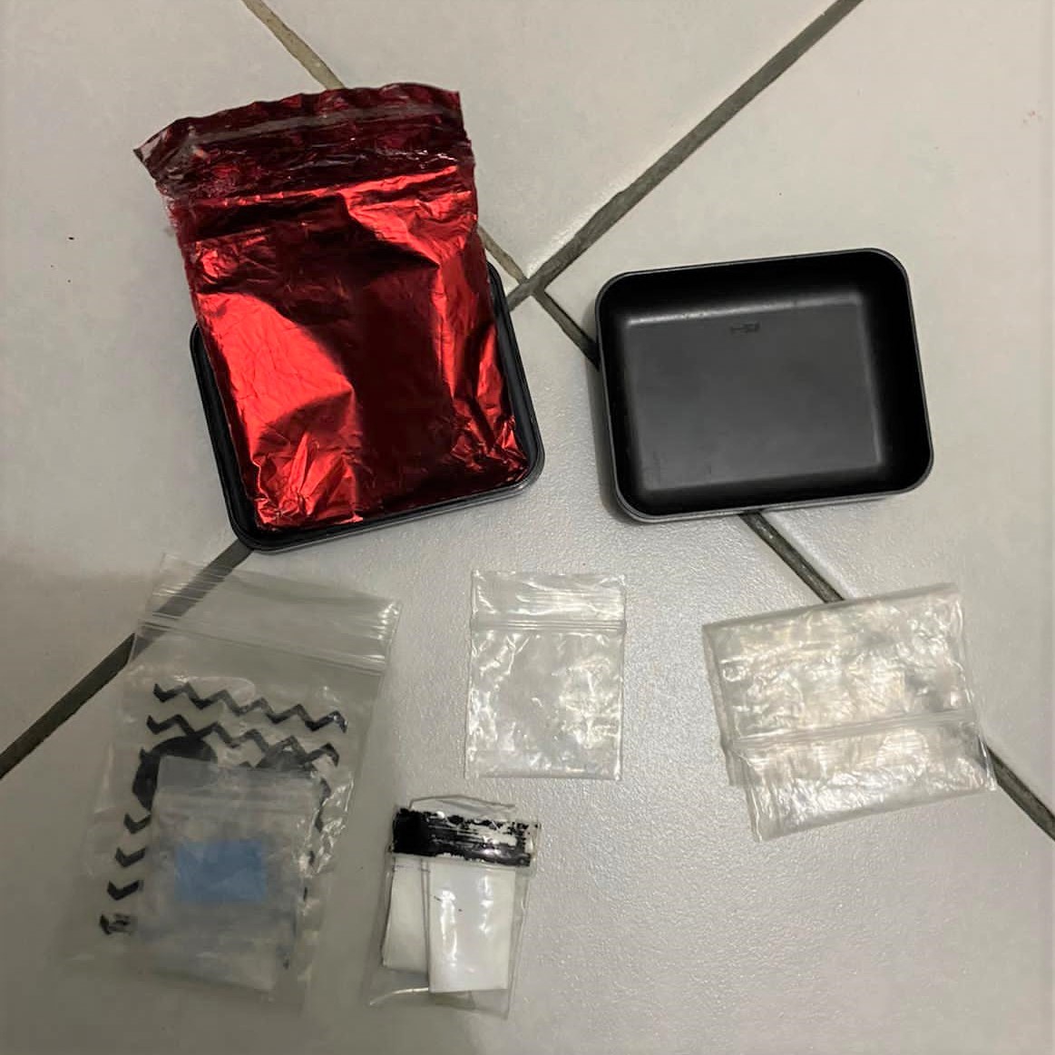 Photo 3: Packets of ‘Ice’ recovered in the vicinity of Lengkok Bahru during a CNB operation on 23 November 2020